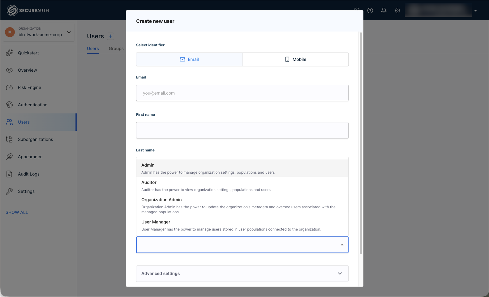 Create new user dialog with the role list expanded, showing the Admin, Auditor, Organization Admin, and User Manager roles with their descriptions